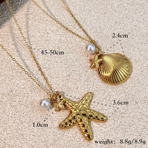 Gold plated ocean theme necklace with starfish shell pendants and pearls 45cm