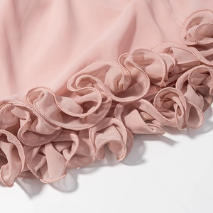 Pink chiffon vacation set with multilayered ruffle details and delicate stitching