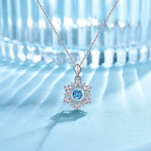 S925 sterling silver snowflake necklace with a dancing blue stone and micro-set zircons