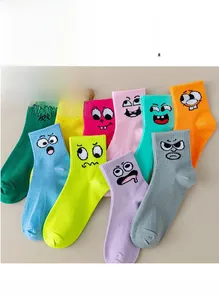 Detail view of colorful mid-calf socks set with cartoon smiley faces in 10 vibrant colors