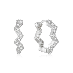 Macro shot of S925 sterling silver wavy hoop earrings featuring cubic zirconia pavé stones