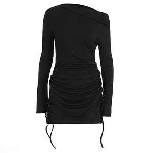 Close-up of the adjustable drawstring and ruched texture on the black knitted dress