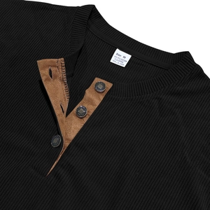 Detail of slim-fit Henley shirt with ribbed texture and brown suede button placket