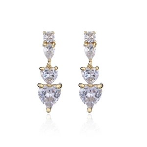Detail of gold dangle earrings with heart-shaped cubic zirconia and pear-cut crystals