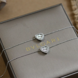Dual 3D silver heart pendant necklaces with radiant pavé crystals on a textured chain
