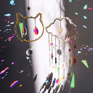 Golden suncatcher with crystal pendants and colorful crushed stones for garden decor