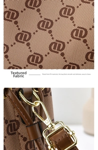 Detail of vintage monogram PU leather texture and gold-tone metal lobster clasp hardware