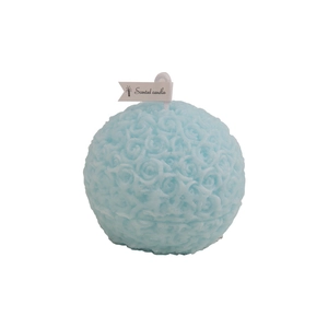 Light blue rose flower shaped scented candle with detailed floral textures on white background