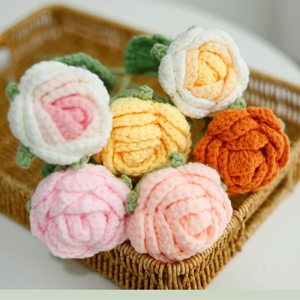 Close-up of handmade crochet rose bouquet in assorted pastel colors for teacher gifts