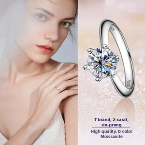 Close-up of S925 sterling silver 2ct Moissanite ring with D color grade engraving