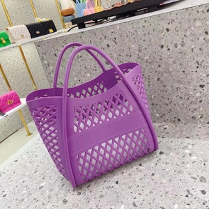 Detailed view of purple hollow silicone beach tote with ergonomic double handles