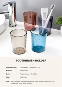 Detail view of colorful transparent bathroom cups in purple, amber, red, and blue colors
