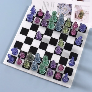 Colorful resin chess set with transparent pieces and classic checkered board design