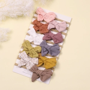 10-piece set of soft nylon baby headbands with embroidered cotton bows in Morandi colors