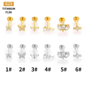 G23 titanium flat back stud earrings with zircon butterfly and leaf designs in gold and silver