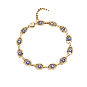 Golden stainless steel bracelet featuring blue heart evil eye charms on a white background