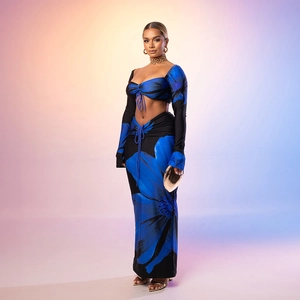 Close-up of floral print drawstring crop top and long skirt set with blue flower patterns
