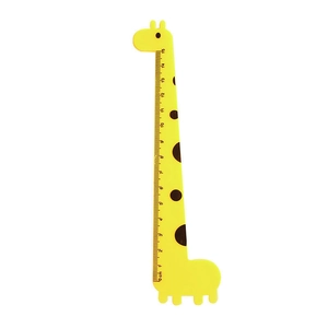 Close-up of yellow giraffe-shaped 15cm ruler showing clear metric scale and cute design