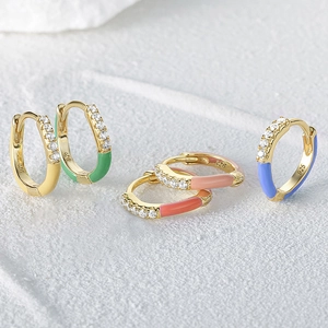 S925 sterling silver hoop earrings with colorful enamel and zircon on a stone surface