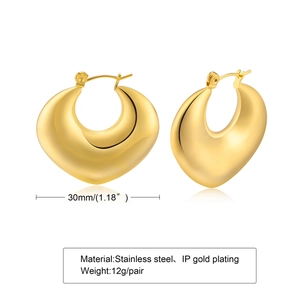 Detailed view of 30mm chunky gold IP plated stainless steel hollow hoop earrings
