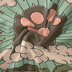 Close-up of bohemian tapestry showing cartoon animal paw print and fabric texture