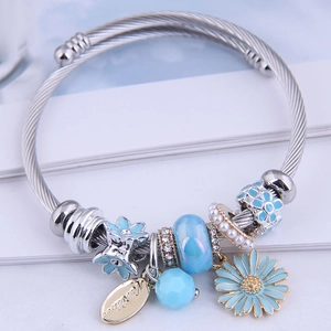 Bohemian silver wire bangle featuring blue enamel daisies, glass beads and crystals