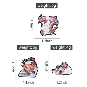 Detailed size and weight specs for cute orange cat enamel pins in various poses