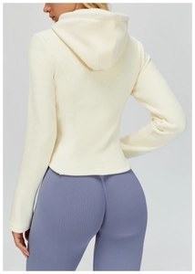 Side view of beige fleece zip-up hooded jacket with slim fit and warm texture