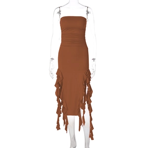 Detailed view of the layered ruffles and waist ruching on this brown tube dress