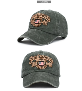 Detail of 3D embroidered San Francisco text and flag shield on washed baseball cap