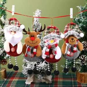 Set of four hanging Christmas tree ornaments featuring Santa, reindeer, snowman, and bear
