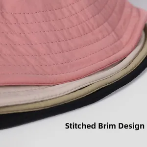 Detail of multi-row stitching on wide brim of quick-dry sun hats in four soft colors