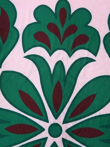 Detail shot of the ethnic floral print fabric on the stylish padded cotton jacket