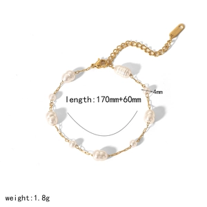 Detail of baroque pearl bracelet with gold chain, lobster clasp and extender chain