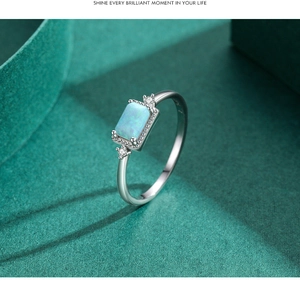 Detailed macro view of S925 silver ring featuring blue opal stone and zircon accents