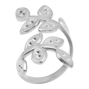 Close-up of adjustable stainless steel leaf ring with detailed hollowed-out texture
