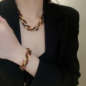 Leopard print link necklace and bracelet set with gold metal and tortoise resin