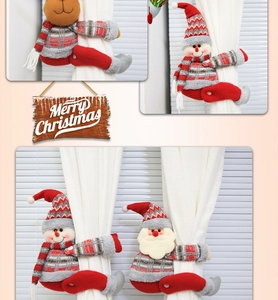 Detailed view of plush reindeer, snowman, and Santa Claus curtain tiebacks decoration