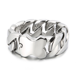 Polished silver cuban link ring featuring a central flower emblem in industrial style