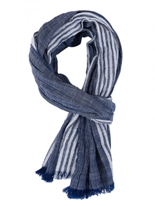 Detail of navy blue and white striped scarf with fringe edges and cotton linen texture