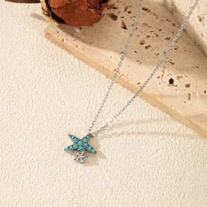 Vintage S925 silver starfish necklace with blue turquoise bead and sparkling zirconia