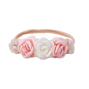 Detail of pink and white chiffon flower headband with soft elastic band for infants