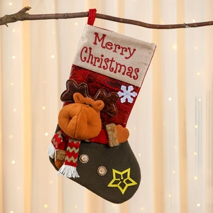 Detailed view of oversized linen Christmas stocking with 3D elk and Merry Christmas print