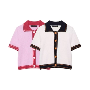 Women's knit cardigans in pink and cream with contrasting trim and button-front design