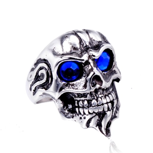 Men's vintage stainless steel skull ring with deep blue gemstone eyes in silver finish