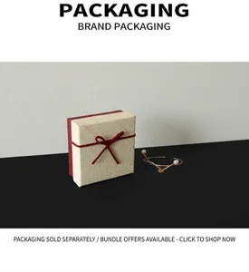 Elegant red jewelry gift box with cream woven lid for gold pearl bead bracelets