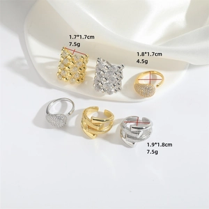 Minimalist teardrop open rings in gold and silver with zircon stones and nail motif