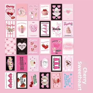 Flat lay of 30 aesthetic Y2K pink girlhood postcards featuring cherries and cute icons