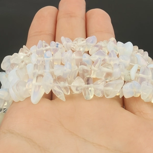 Macro detail of natural translucent white agate stone beads for DIY jewelry making
