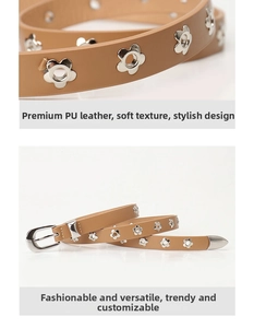 Detail of khaki PU leather belt with silver flower-shaped metal eyelets and stitch texture